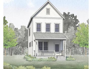 Charming two-story home featuring a welcoming front porch and classic architectural details at 1576 Piney Fls Dr, Wendell, NC 27591