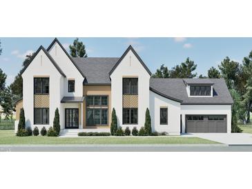 Charming home with white brick, dark framed windows, gray roof, and lovely lawn at 249 Mollie Meadow Dr, Zebulon, NC 27597