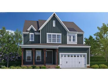 Charming two-story home featuring a two-car garage and traditional architectural details in a desirable community at 2220 Yumeewarra Dr, Apex, NC 27502