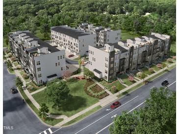 Stunning aerial view of new townhome community surrounded by lush greenery at 509 Kildaire Farm Rd # 307, Cary, NC 27511