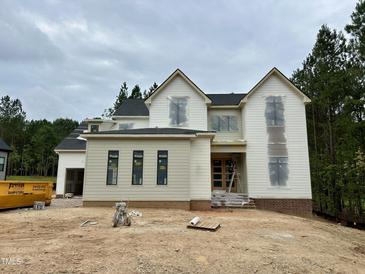 New construction home with two stories and neutral siding, ready for personalization at 155 Cherry Bark Dr, Youngsville, NC 27596