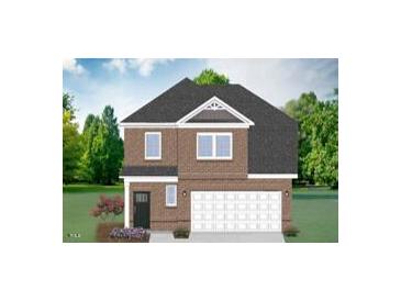 Charming brick two-story home with a two-car garage and a beautifully landscaped front yard at 807 Outlaw Ave # 19, Durham, NC 27703