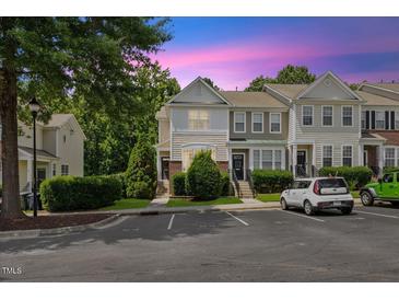 Charming townhome with manicured landscaping and convenient parking at 7856 Spungold St, Raleigh, NC 27617