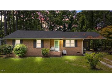Charming single-story brick home featuring a well-maintained lawn and a welcoming front entrance at 625 Powell Dr, Rocky Mount, NC 27803
