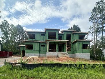 Modern home under construction showing unique architectural design and quality building materials at 2344 Ballywater Lea Way, Wake Forest, NC 27587