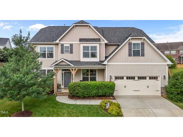 Traditional two-story home with neutral siding, gray shutters, and an attached two-car garage at 184 Elgin Ct, Burlington, NC 27215