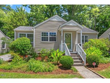 Charming home with a well-maintained front yard and inviting entrance, enhancing curb appeal at 2504 State St, Durham, NC 27704
