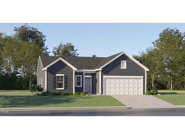 Charming single-story home featuring a well-manicured lawn, two-car garage, and inviting gray color palette at 43 Playtime Cir, Princeton, NC 27569