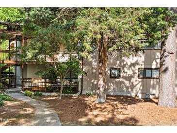 Charming condo with mature trees and landscaping, offering a serene and private setting at 5082 Flint Ridge Pl, Raleigh, NC 27609