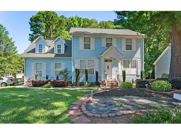 Charming two-story home with a well-manicured lawn and beautiful landscaping, great curb appeal at 3610 Long Ridge Rd, Durham, NC 27703