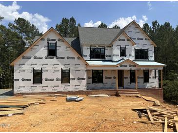 New home construction showing the front facade with windows installed at 49 Cloudview Ct, Pittsboro, NC 27312
