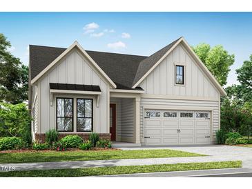 Charming new construction with neutral siding, black window trim, and an attached two-car garage at 64 Firefly Ln, Fuquay Varina, NC 27526