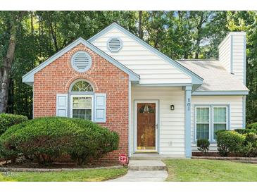 Charming single-Gathering home with a brick facade, decorative trim, and well-maintained landscaping at 108 Ellsworth Pl, Cary, NC 27511