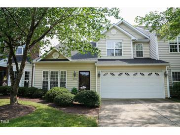 Charming two-story home featuring a two-car garage and beautifully landscaped front yard at 3423 Van Hessen Dr, Raleigh, NC 27614