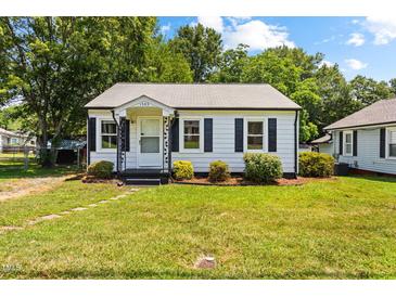 Charming single-story home with black shutters and landscaped front yard at 1543 Wickham St, Burlington, NC 27215