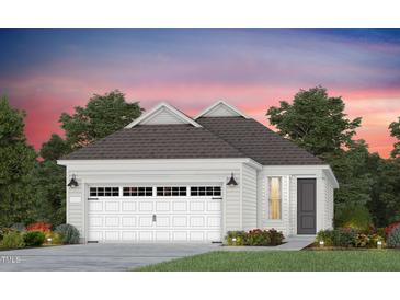 Charming single-story home with a two-car garage, tidy landscaping, and a welcoming front door at 189 Churchill Way, Clayton, NC 27520