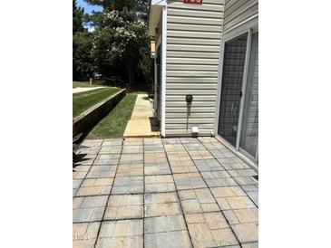 Private patio with easy access to outdoors at 2221 Valley Edge Dr # 100, Raleigh, NC 27614