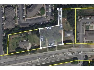 Aerial view showing property boundaries and nearby commercial and residential areas at 4503 Hopson Rd, Morrisville, NC 27560