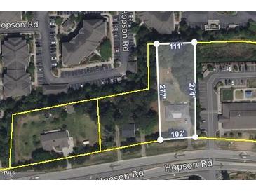 An aerial view shows land and building dimensions on Hopson Road with nearby apartments and parking lots at 4511 Hopson Rd, Morrisville, NC 27560