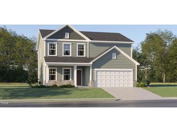 Charming two-story home with stone accents, neutral siding and an attached two-car garage at 576 Roy Adams Ct, Angier, NC 27501