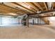 Spacious unfinished basement with exposed beams, ductwork, and a concrete floor at 164 Clove Hitch Ln, Fuquay Varina, NC 27526