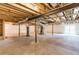 Unfinished basement showing exposed ceiling, water heater, and foundation walls at 164 Clove Hitch Ln, Fuquay Varina, NC 27526