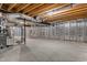 Unfinished basement with visible ducts and insulated walls, ready for customization at 164 Clove Hitch Ln, Fuquay Varina, NC 27526