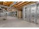Unfinished basement showing utilities and insulated walls, offering potential for expansion at 164 Clove Hitch Ln, Fuquay Varina, NC 27526