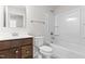 Bathroom featuring a vanity and a tub and shower combo, providing a practical space for daily routines at 164 Clove Hitch Ln, Fuquay Varina, NC 27526