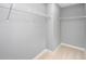 Bright walk-in closet with wire shelving, and neutral carpet at 164 Clove Hitch Ln, Fuquay Varina, NC 27526