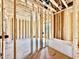 Bathroom framing showcasing a new bathtub, exposed pipes and wiring at 508 Northwood Dr, Raleigh, NC 27609