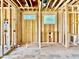 Unfinished bathroom with plumbing fixtures and natural light from two windows at 508 Northwood Dr, Raleigh, NC 27609