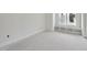 Bright bedroom featuring built-in shelves below window at 508 Northwood Dr, Raleigh, NC 27609