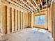 Framing of room with window overlooking other homes and natural light at 508 Northwood Dr, Raleigh, NC 27609