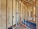 Framing of bathroom with exposed plumbing and electrical wiring at 508 Northwood Dr, Raleigh, NC 27609