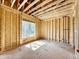Bright room shows wood framing, exposed ceiling with a large window providing lots of natural light at 508 Northwood Dr, Raleigh, NC 27609