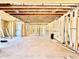 A large unfinished living room features an open floor plan and natural light at 508 Northwood Dr, Raleigh, NC 27609