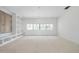 Bright living room featuring built-in shelving and a large window, perfect for relaxation and entertaining at 508 Northwood Dr, Raleigh, NC 27609