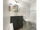 Bright bathroom featuring a vanity with modern finishes, an updated toilet, and a bathtub with white walls at 130 S Estes Dr # B7, Chapel Hill, NC 27514