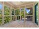 Enjoy outdoor views from this screened porch with wood flooring at 50100 Manly, Chapel Hill, NC 27517