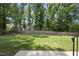 Large backyard with privacy fence and ample space for outdoor activities at 5305 Dixon Dr, Raleigh, NC 27609