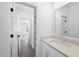 Well-lit bathroom features a vanity with modern fixtures and stylish tile flooring at 5305 Dixon Dr, Raleigh, NC 27609