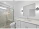 Modern bathroom boasts a glass-enclosed shower, sleek vanity, and stylish fixtures at 5305 Dixon Dr, Raleigh, NC 27609
