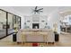 Spacious living room with a modern fireplace, comfortable seating, and stylish decor at 5305 Dixon Dr, Raleigh, NC 27609