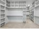 Large walk-in closet with ample shelving and storage space for clothes and accessories at 5305 Dixon Dr, Raleigh, NC 27609