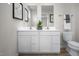 Bright bathroom features a double sink vanity with modern fixtures and hardware at 356 N Coral Bells Way Way, Four Oaks, NC 27524
