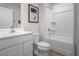 Functional bathroom with a vanity, toilet, and shower/tub combo at 356 N Coral Bells Way Way, Four Oaks, NC 27524