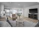 Comfortable living room area flowing into the kitchen and dining spaces at 356 N Coral Bells Way Way, Four Oaks, NC 27524
