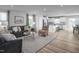 Open living space with stylish furnishings and an adjacent modern kitchen at 356 N Coral Bells Way Way, Four Oaks, NC 27524