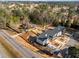 Aerial view of new construction homes surrounded by lush greenery at 100 Farris Ct, Raleigh, NC 27610